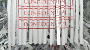 shredded paper that says confidential