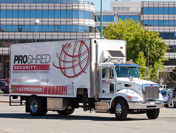 Proshred Truck in front of office buildings