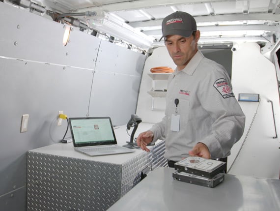 Service Tech Inside Mobile Shred Truck