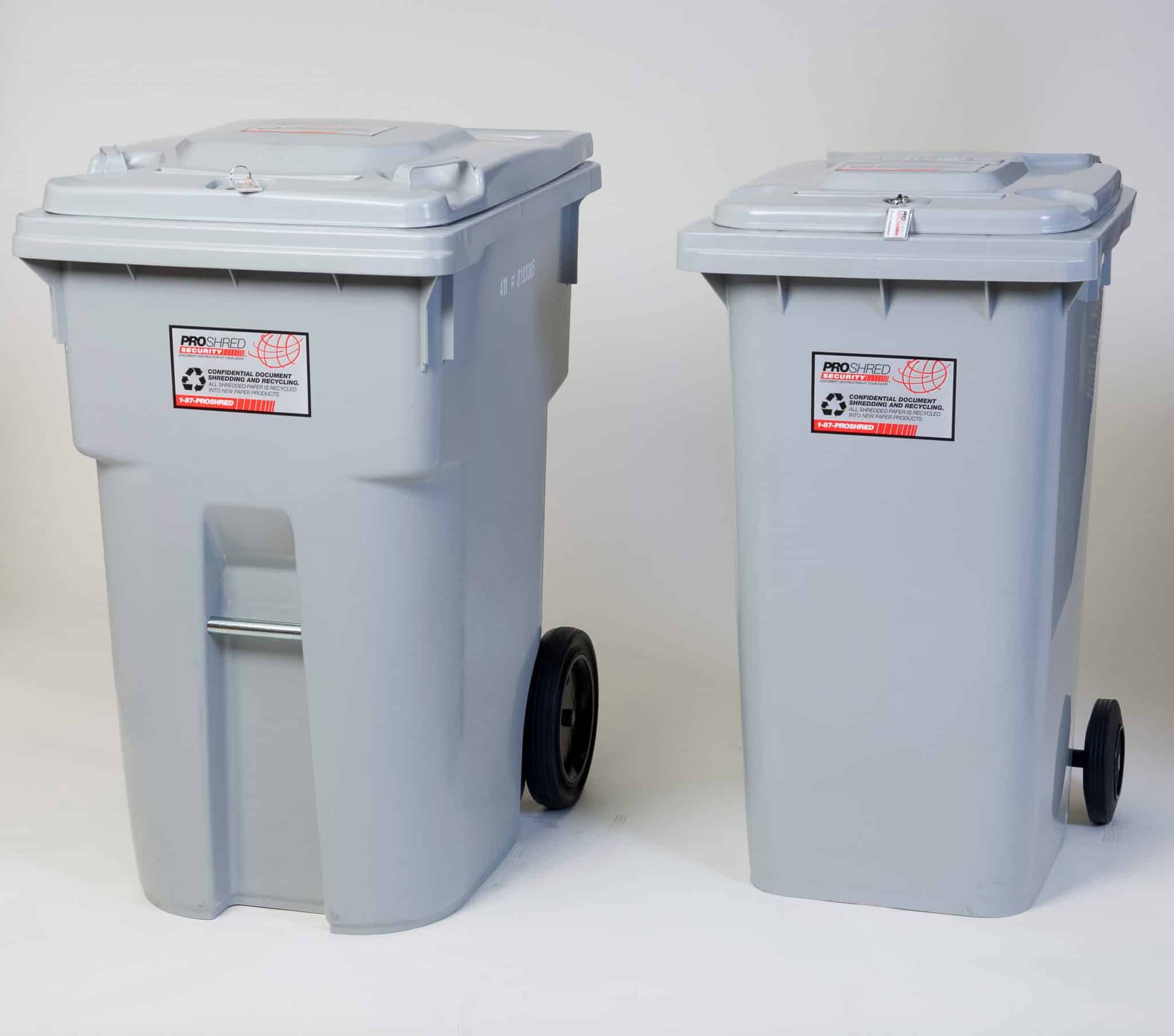 PROSHRED employee pushing a 96-gallon high-volume shredding bin.