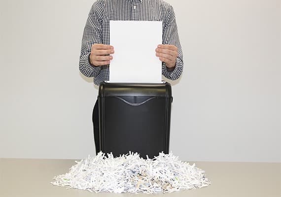 office employing using an office shredder 