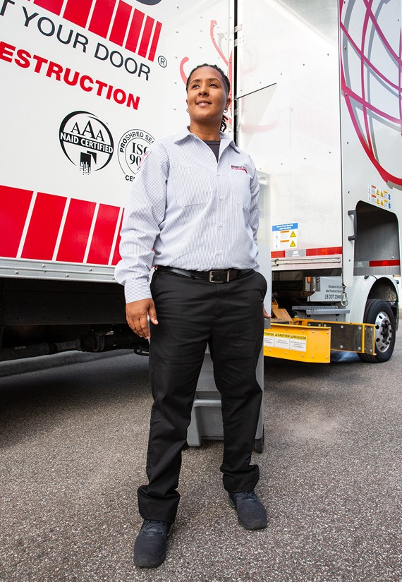 Employee doing a mobile shredding job in a residential area.