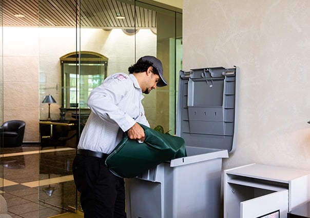 PROSHRED driver removing the contents from inside the secure console bin